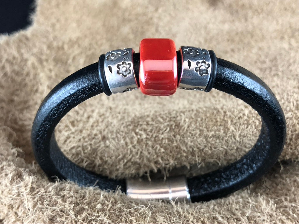 Black Leather Bracelet with Red Ceramic Bead Slider and Antique Sterling Silver Daisies