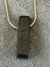 "Love" Basalt Sand Carved Focal Bead