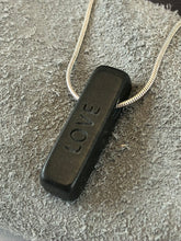 "Love" Basalt Sand Carved Focal Bead