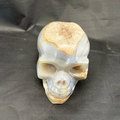 Carved Agate Skull with Crystal Filled Cavity - 810 grams
