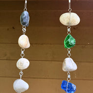2 strands of hanging stone and glass cullet pieces wrapped in wire hanging side by side