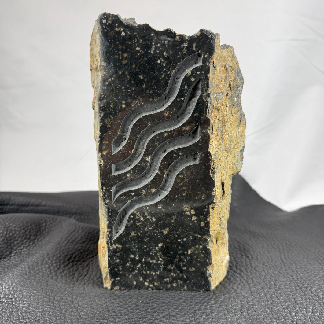 Pacific Northwest Basalt Column with Sand-Carved Parallel Wavy Lines