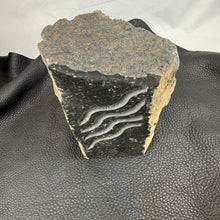 Pacific Northwest Basalt Column with Sand-Carved Parallel Wavy Lines