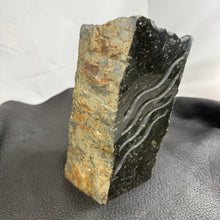 Pacific Northwest Basalt Column with Sand-Carved Parallel Wavy Lines