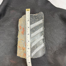 Pacific Northwest Basalt Column with Sand-Carved Parallel Lines